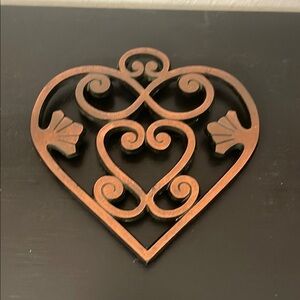 Pampered Chef 2010 cast iron trivet 
Round-up from the Heart